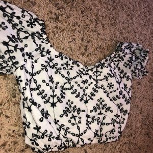 white with black embroidery off the shoulder crop!